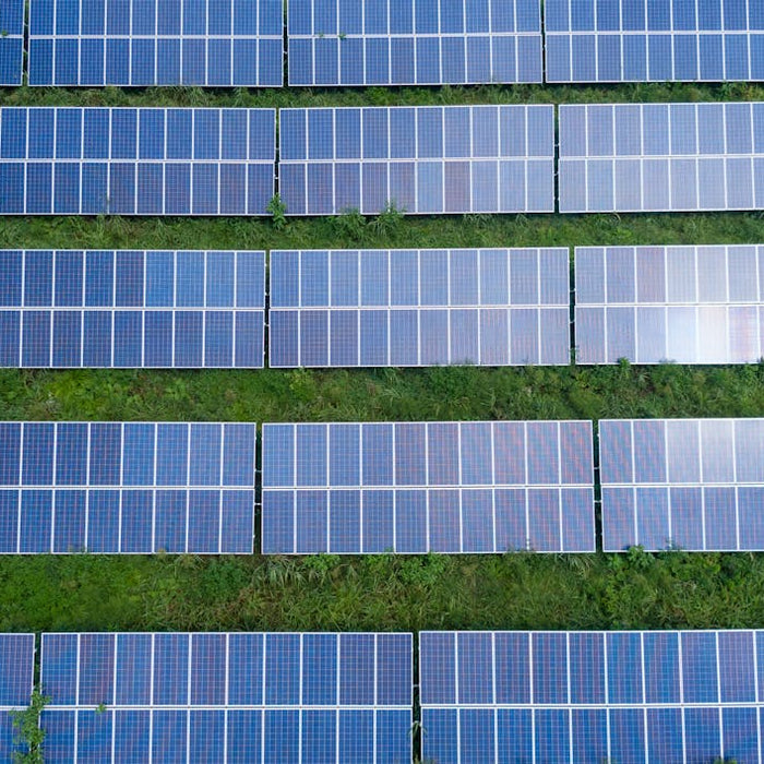 aerial view of rows of solar panels